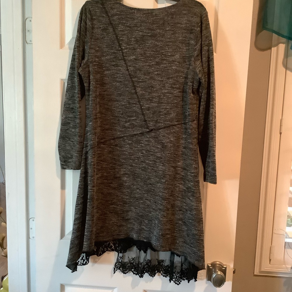 Cute one piece dress with lace at the bottom